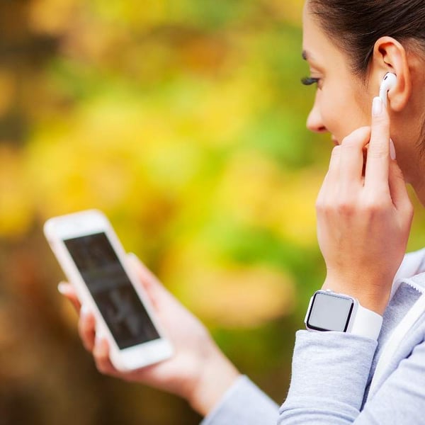 woman using Bluetooth technology