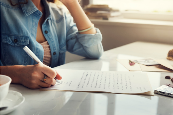 woman writing a letter