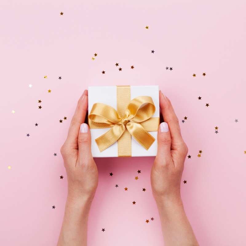 Woman holding an inexpensive wedding gift