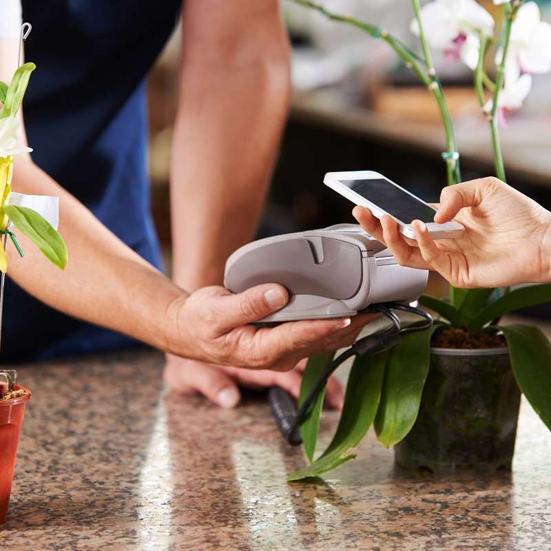 member using mobile payment during coronavirus pandemic