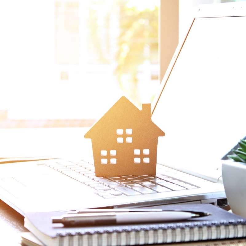 laptop used to refinance a mortgage