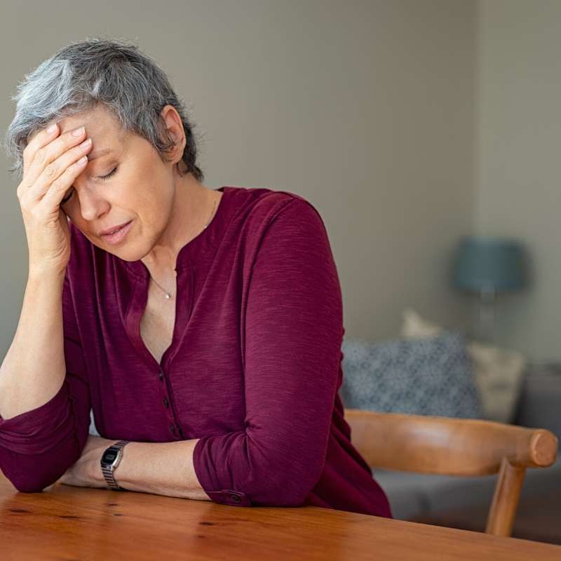 woman thinking of money problems at work