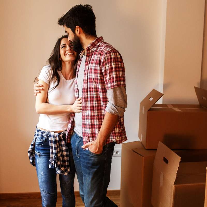 couple hugging in their new home