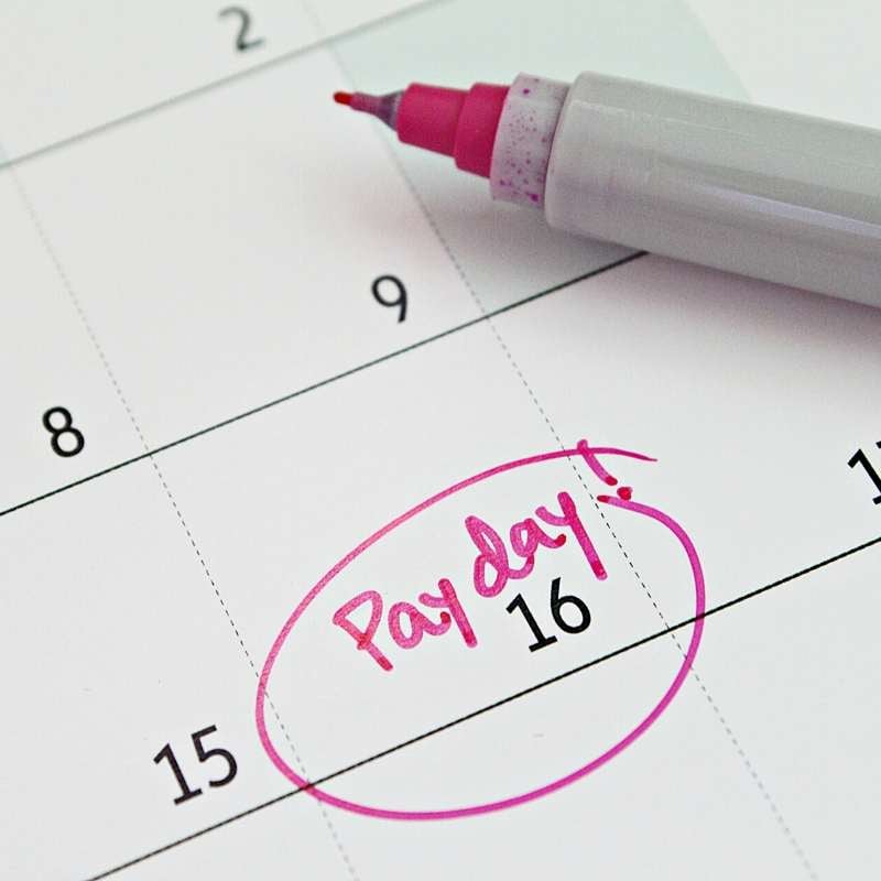 calendar with payday circled two days earlier with Payday Perqs