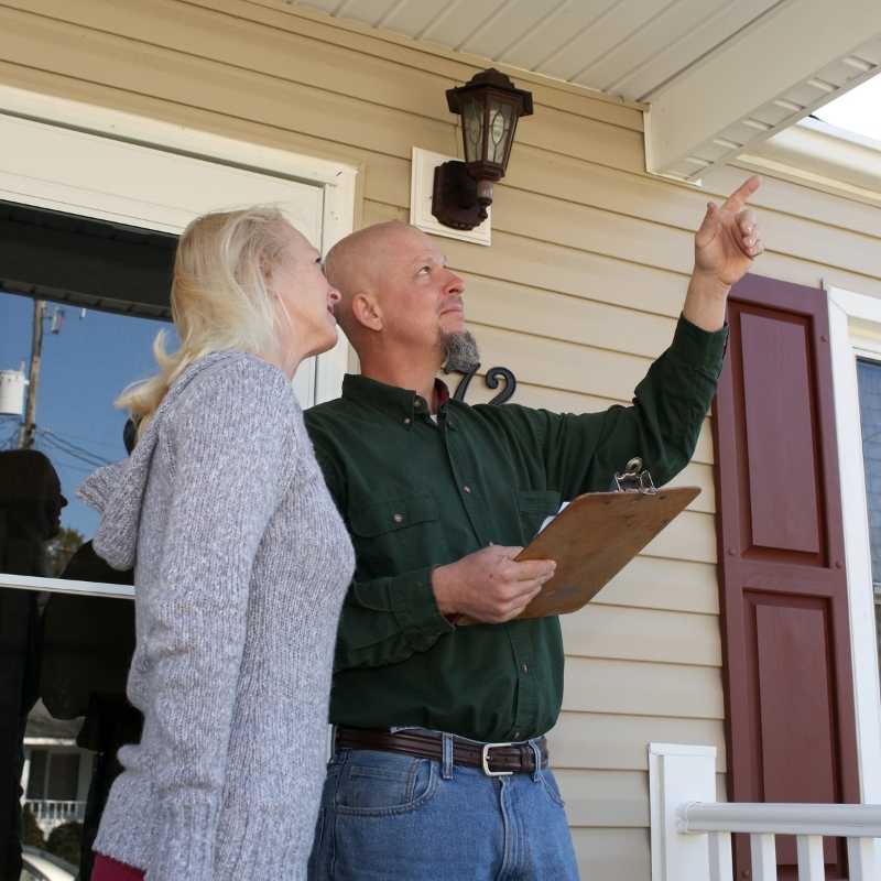 older woman with male home inspector