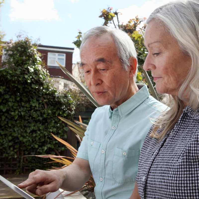 older couple looking at secure account